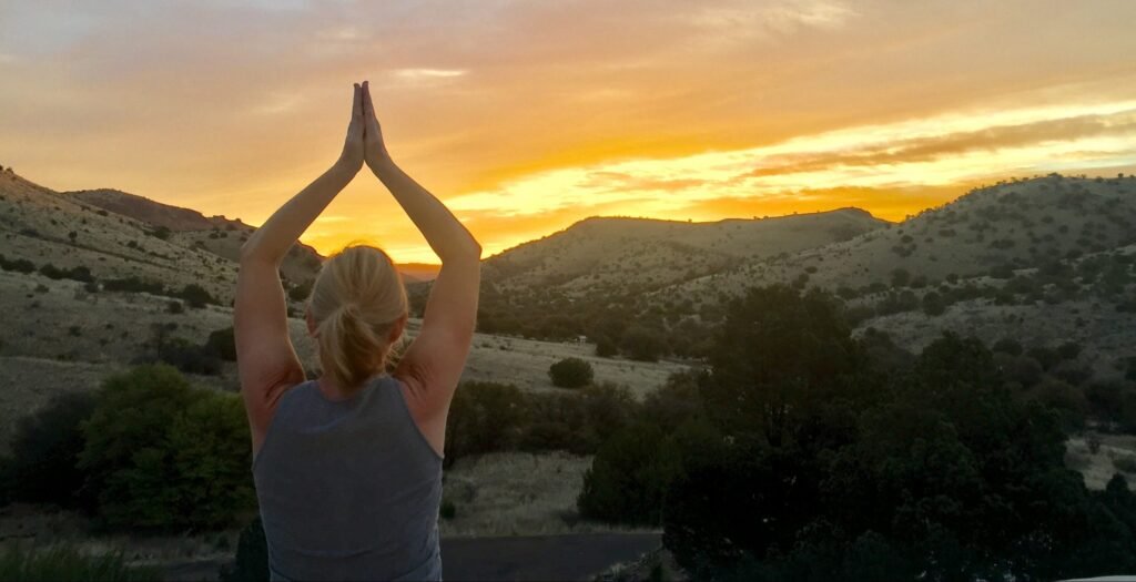 yoga practice with a mountain view